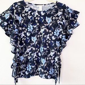 H&M’s floral cotton top with ties on sides. Size M